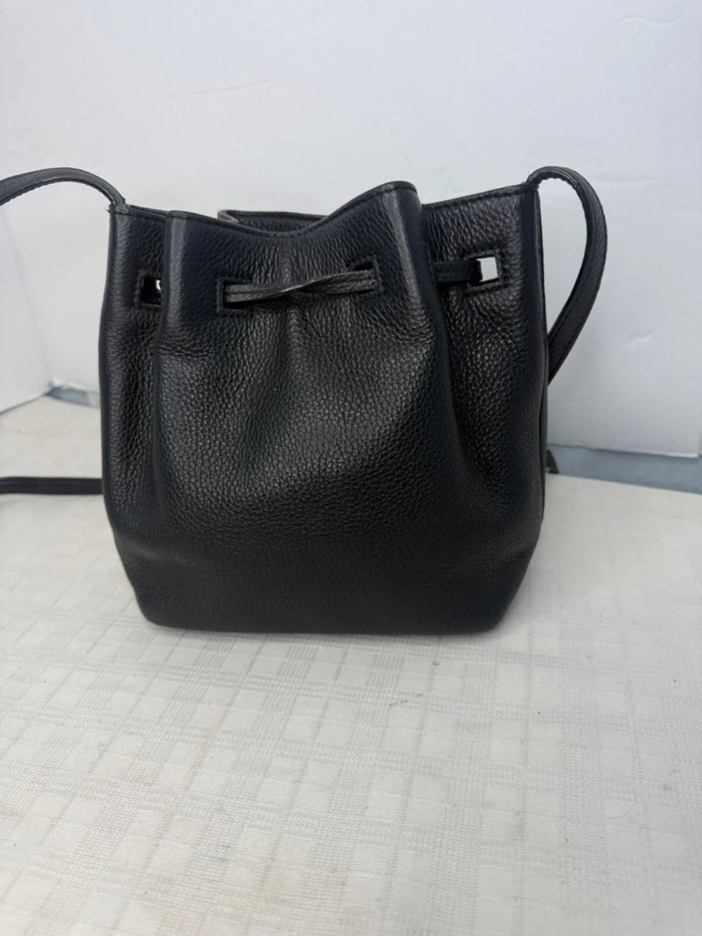 Kate Spade New York drawstring bucket bag, from the Grey Street  Tiny Cooper